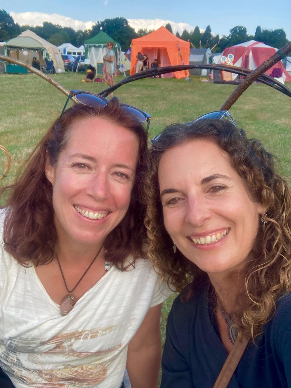 Emma and Marleen, the founders of Well&Work, smiling together outdoors